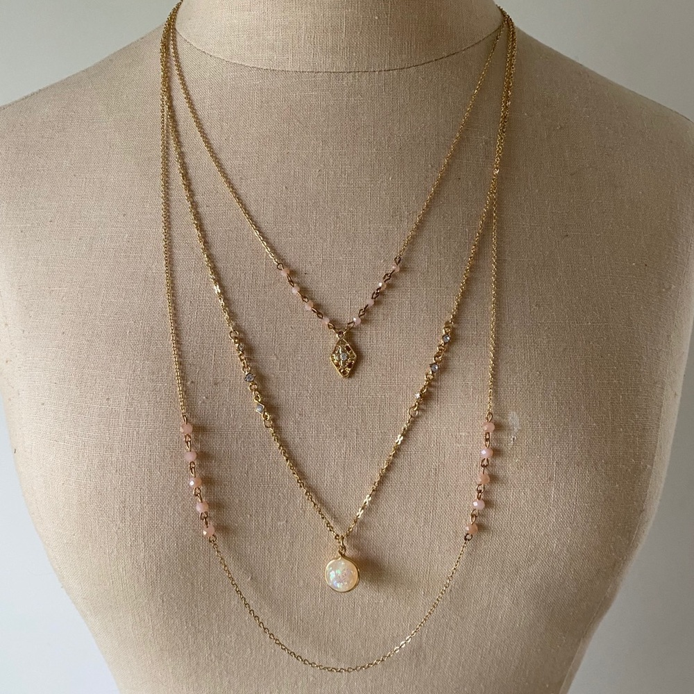 Three stranded gold necklace